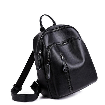Stylish PU backpack in black, red, and blue colors with multiple compartments and adjustable straps for versatile and organized storage