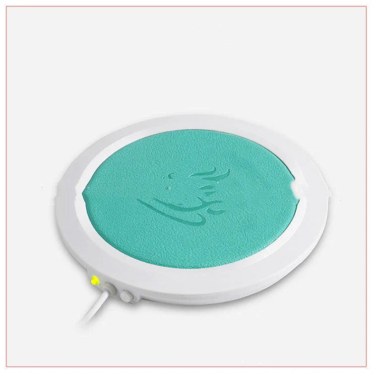 Sleek USB-powered cup warmer in various colors, keeping drinks hot and toasty