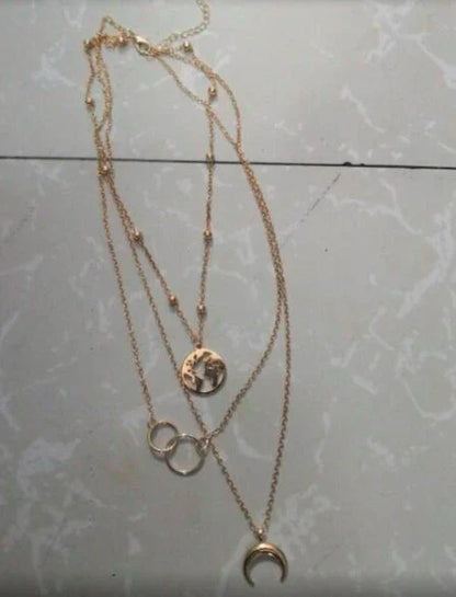 Stunning multi-layer boho moon pendant necklace with intricate design and electroplated finish