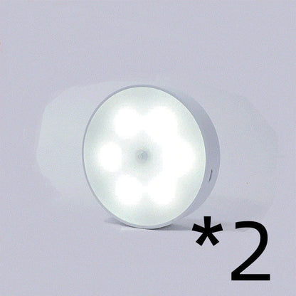 Motion-activated LED puck lights in warm and white color options, with various pack sizes and USB recharging