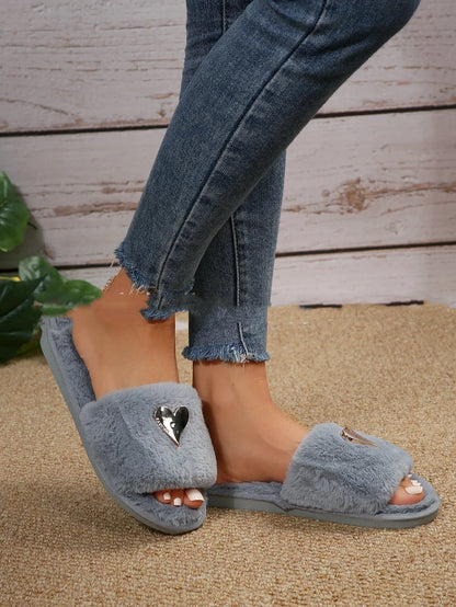 Cosy faux fur slippers in various colours for comfortable indoor wear