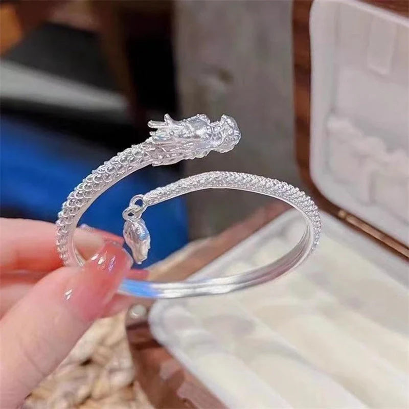 Adjustable Chinese-style dragon tail bangle bracelet with intricate dragon and phoenix decorations