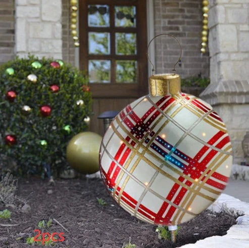 Inflatable Christmas baubles in various festive designs for outdoor holiday decoration