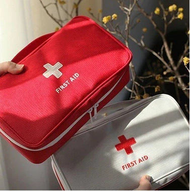 Large empty first aid kit in red, made from durable 600D Oxford cloth for outdoor and travel use
