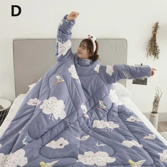 Cozy quilted lounger with sleeves in various colors and sizes, perfect for year-round indoor comfort and relaxation.