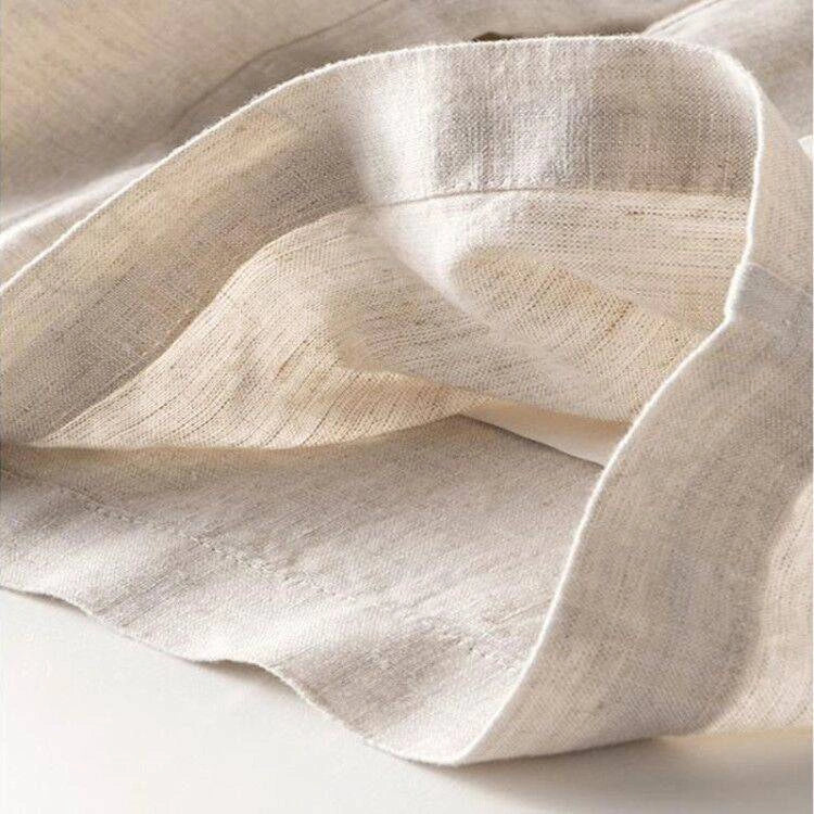 Stylish and comfortable cotton and linen trousers for British women, featuring a high-waist, straight-leg design in a range of classic colours.