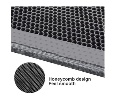 Honeycomb-patterned cat litter mat with a waterproof base, designed to trap litter and protect floors from leaks and spills