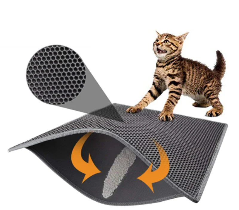 Honeycomb-patterned cat litter mat with a waterproof base, designed to trap litter and protect floors from leaks and spills