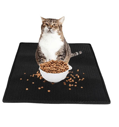 Honeycomb-patterned cat litter mat with a waterproof base, designed to trap litter and protect floors from leaks and spills