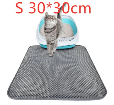 Honeycomb-patterned cat litter mat with a waterproof base, designed to trap litter and protect floors from leaks and spills