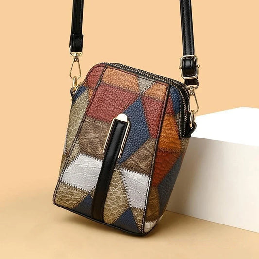 Stylish leather shoulder bag with distinctive stitching and versatile design for everyday wear