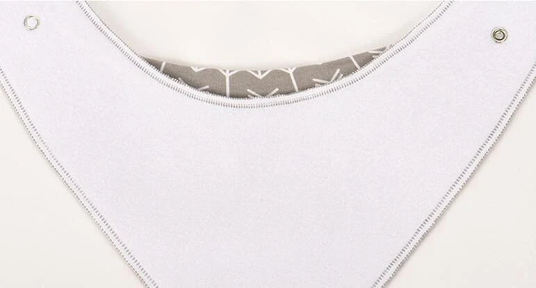 Stylish baby bibs set with arrow, wave, and triangle prints, perfect for keeping your baby clean and fashionable.