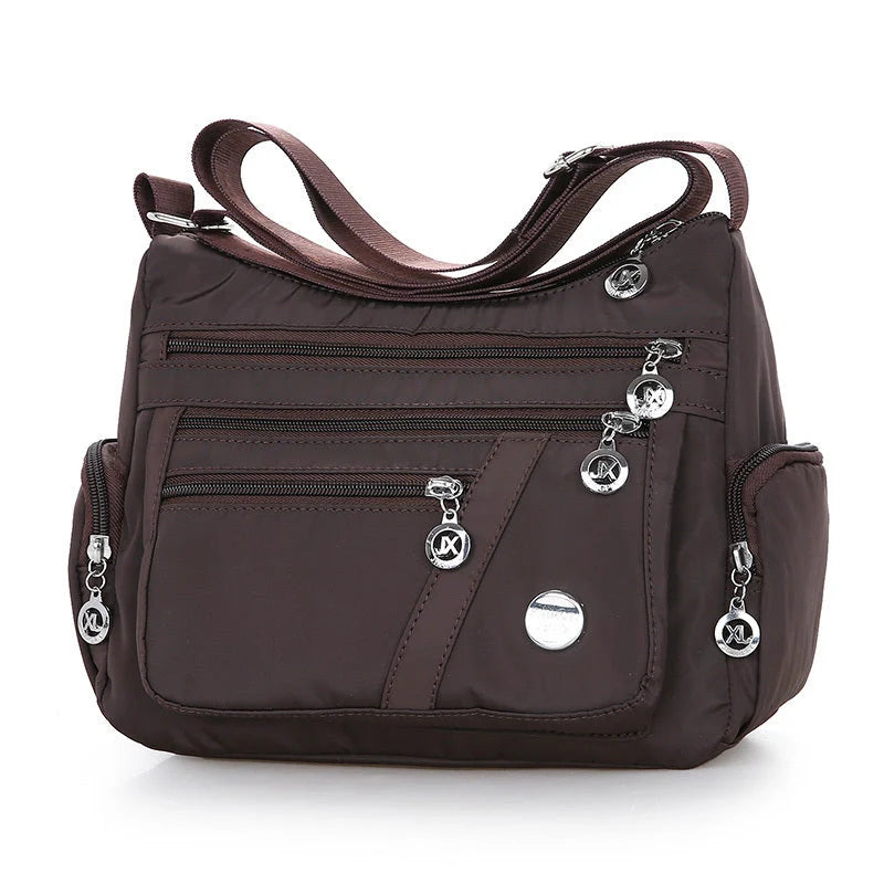 Ladies waterproof nylon oxford crossbody bag in various colors with multi-layer storage