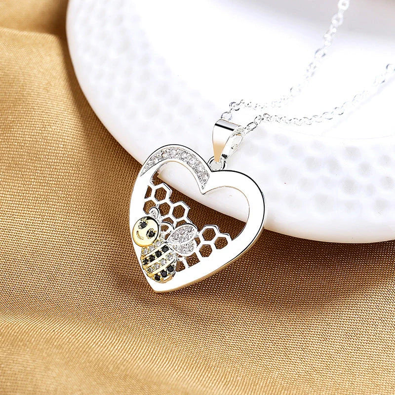 Unique bee hive pendant necklace with hearts colour separation, pastoral style