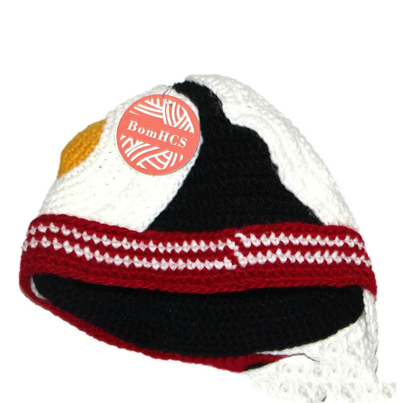 Hand-knitted egg hat in white with stripe pattern, perfect for winter and parties