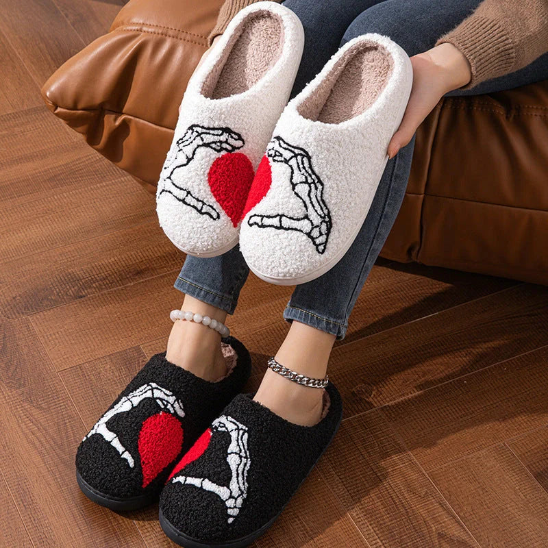 Halloween Skull Hand Slippers in black and white with non-slip soles