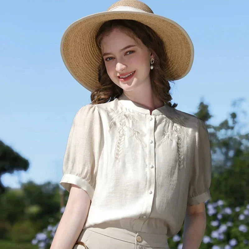Elegant silk blend blouse with Chinese-inspired puff sleeves and a timeless design