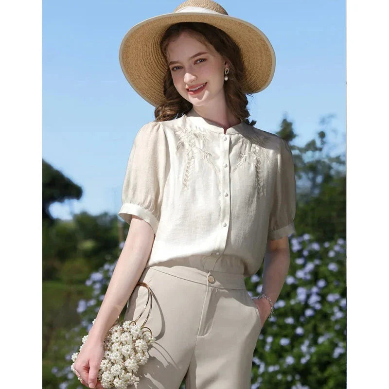 Elegant silk blend blouse with Chinese-inspired puff sleeves and a timeless design