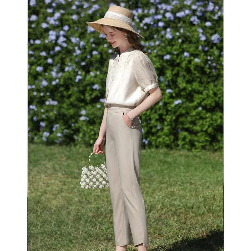 Elegant silk blend blouse with Chinese-inspired puff sleeves and a timeless design