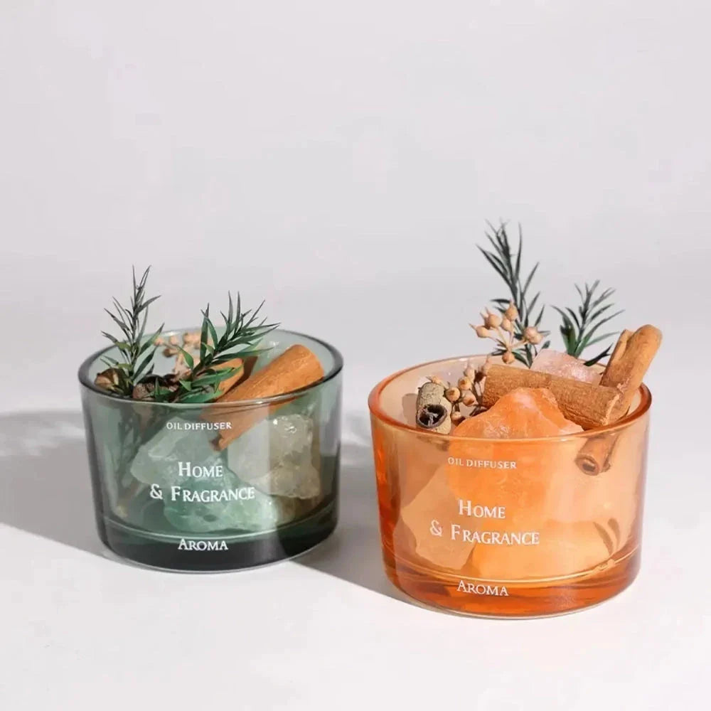 Natural stone essential oil diffuser with decorative flowers and plants, creating a calm and tranquil atmosphere in the home.