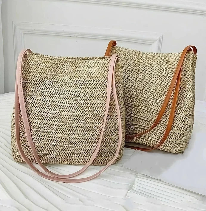 Bohemian straw woven shoulder bag with a compact yet spacious design, perfect for summer outings and beach getaways.