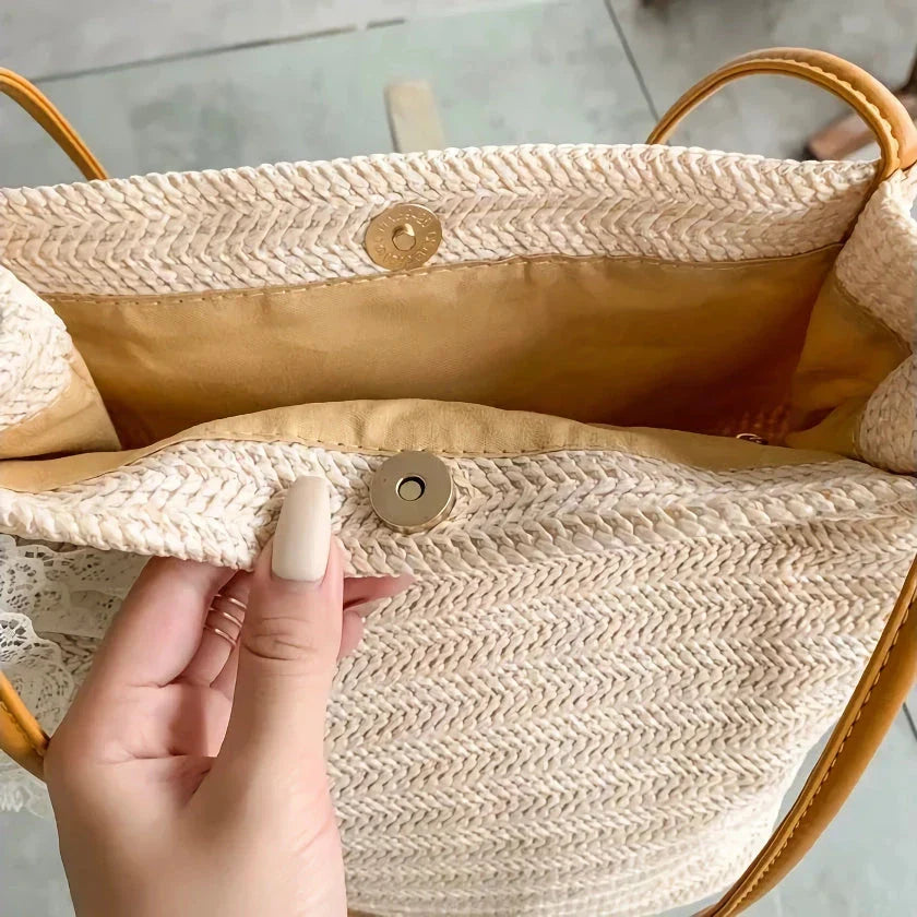 Bohemian straw woven shoulder bag with a compact yet spacious design, perfect for summer outings and beach getaways.
