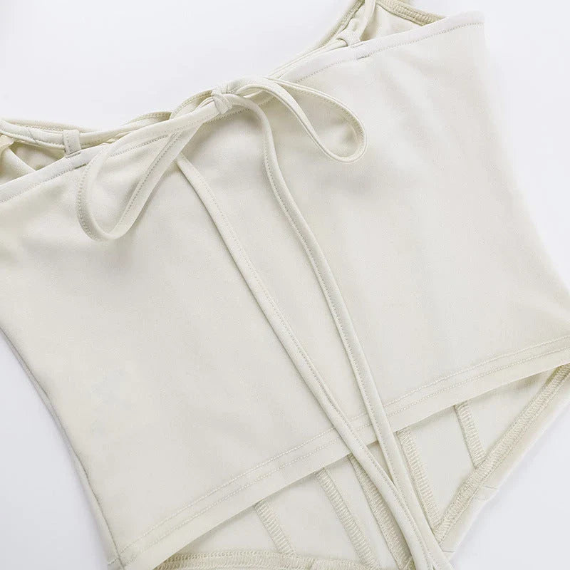 Elegant backless ruffle tank top in a floral print pattern, perfect for summer outings