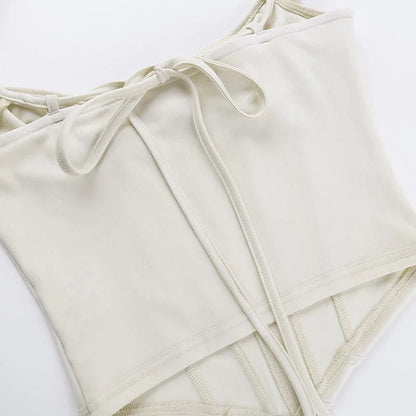 Elegant backless ruffle tank top in a floral print pattern, perfect for summer outings