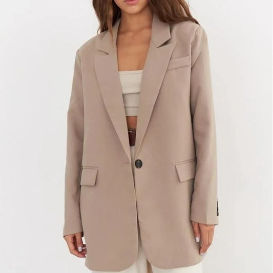 Women's oversized blazer in khaki color, featuring a classic design with a subtle button detail for a sophisticated look.