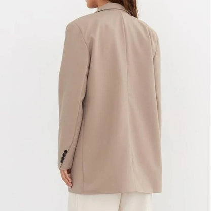 Women's oversized blazer in khaki color, featuring a classic design with a subtle button detail for a sophisticated look.