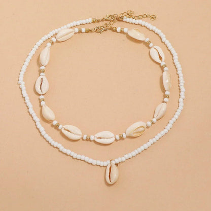 Bohemian Summer Sea Shell Choker Necklace Set with adjustable closure and natural sea shell and bead design