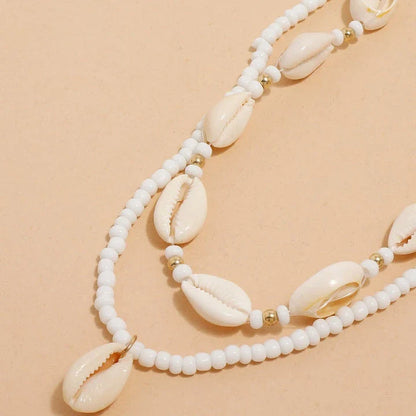 Bohemian Summer Sea Shell Choker Necklace Set with adjustable closure and natural sea shell and bead design