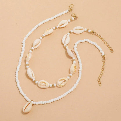 Bohemian Summer Sea Shell Choker Necklace Set with adjustable closure and natural sea shell and bead design