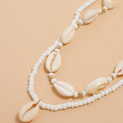 Bohemian Summer Sea Shell Choker Necklace Set with adjustable closure and natural sea shell and bead design