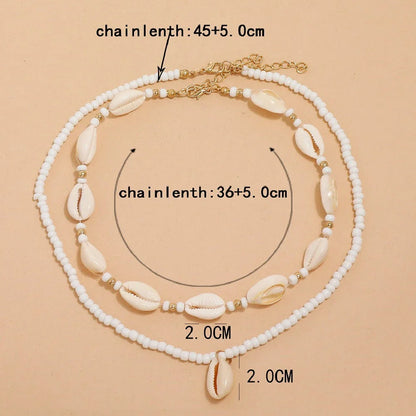 Bohemian Summer Sea Shell Choker Necklace Set with adjustable closure and natural sea shell and bead design