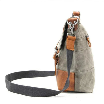 Overflowing canvas retro style men's shoulder bag in khaki colour with adjustable strap and multiple internal pockets
