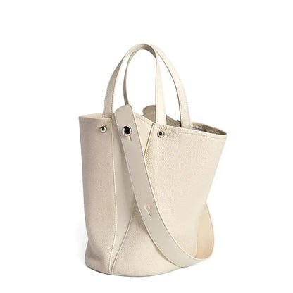 Luxurious genuine leather bucket shoulder bag with adjustable strap and interior pockets, perfect for British women's everyday use