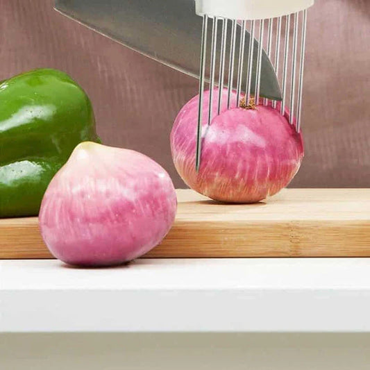 Stainless steel vegetable holder securely gripping various produce for precise slicing and dicing in the kitchen