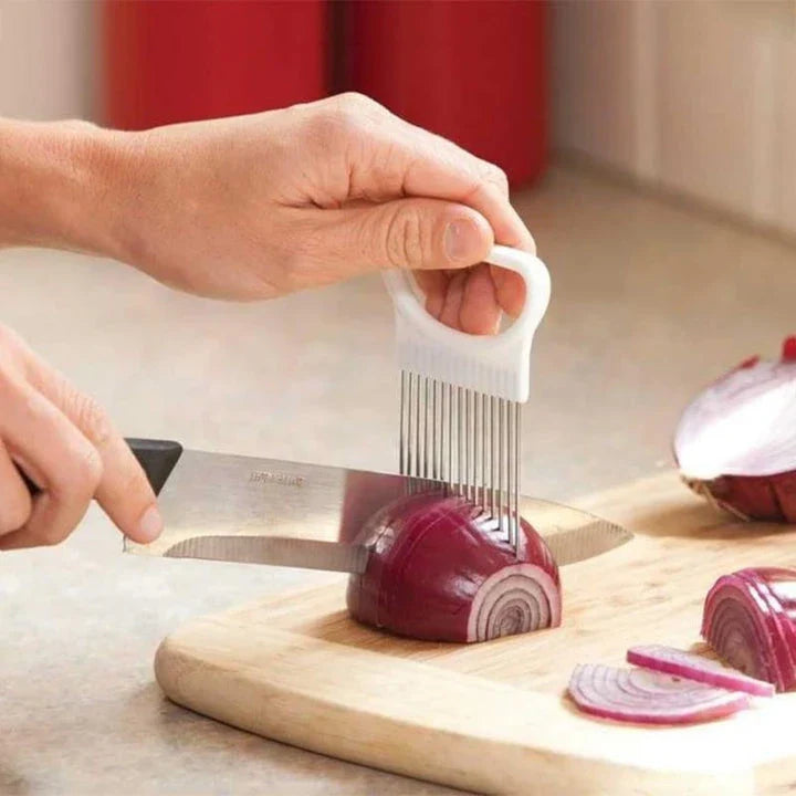 Stainless steel vegetable holder securely gripping various produce for precise slicing and dicing in the kitchen