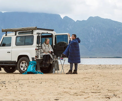 Sleeping Bag Hoodie Poncho in various colours, featuring a cosy design for outdoor activities