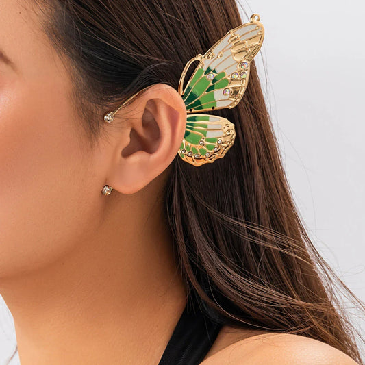 Pair of green alloy butterfly ear cuff earrings with sparkling rhinestones
