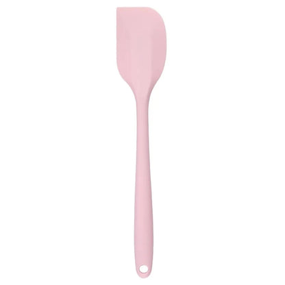 A vibrant red silicone baking spatula with an ergonomic handle and double-sided arc design, perfect for a variety of cooking and baking tasks.