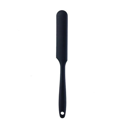 A vibrant red silicone baking spatula with an ergonomic handle and double-sided arc design, perfect for a variety of cooking and baking tasks.