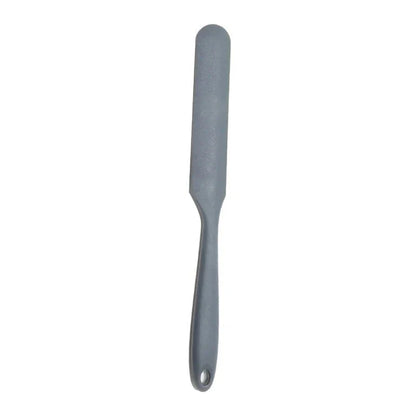 A vibrant red silicone baking spatula with an ergonomic handle and double-sided arc design, perfect for a variety of cooking and baking tasks.