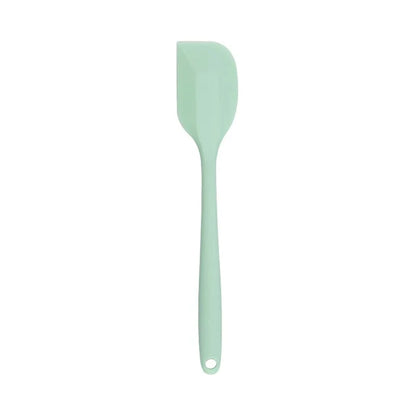 A vibrant red silicone baking spatula with an ergonomic handle and double-sided arc design, perfect for a variety of cooking and baking tasks.