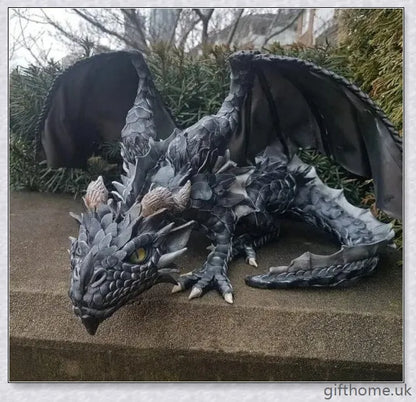 Large handmade resin and metal squatting dragon sculpture, with a mysterious and enchanting design that brings delight to indoor and outdoor spaces.