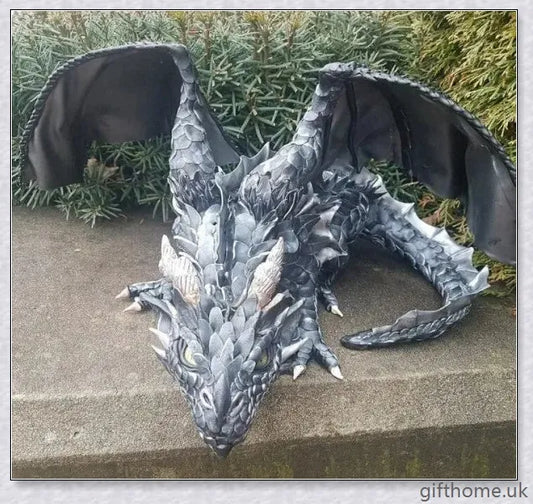 Large handmade resin and metal squatting dragon sculpture, with a mysterious and enchanting design that brings delight to indoor and outdoor spaces.