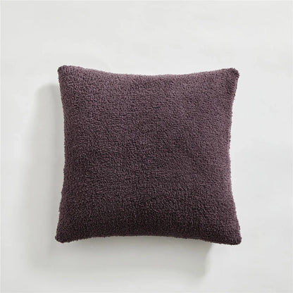 Cosy plush sofa cushion cover made of soft and fluffy microfibre material in a solid yellow colour
