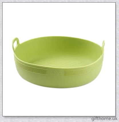 Silicone air fryer bowl in yellow and green colours, featuring square and round shapes for versatile cooking