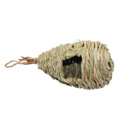 A natural straw bird's nest with a cosy, inviting design to provide a comfortable home for birds.